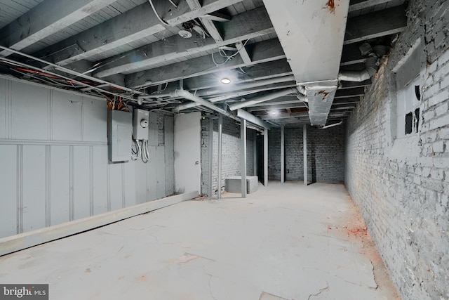 unfinished basement with electric panel