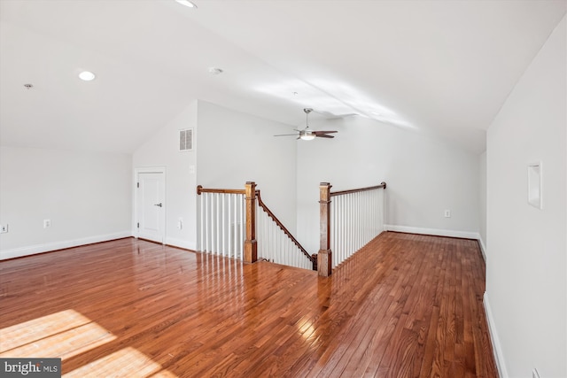bonus room with lofted ceiling, recessed lighting, visible vents, and wood-type flooring