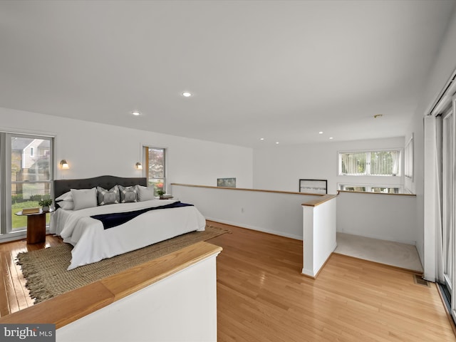 1924 Hidden Point Rd, Annapolis, MD 21409 - bedroom with light wood-style flooring, multiple windows, and recessed lighting