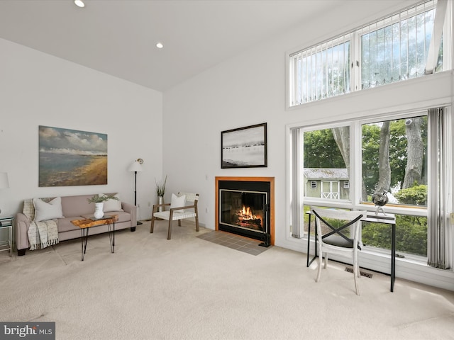1924 Hidden Point Rd, Annapolis, MD 21409 - sitting room featuring carpet, a fireplace with flush hearth, recessed lighting, and a high ceiling