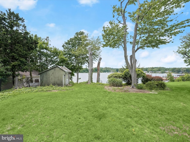 1924 Hidden Point Rd, Annapolis, MD 21409 - view of yard featuring a water view, an outdoor structure, and a storage unit