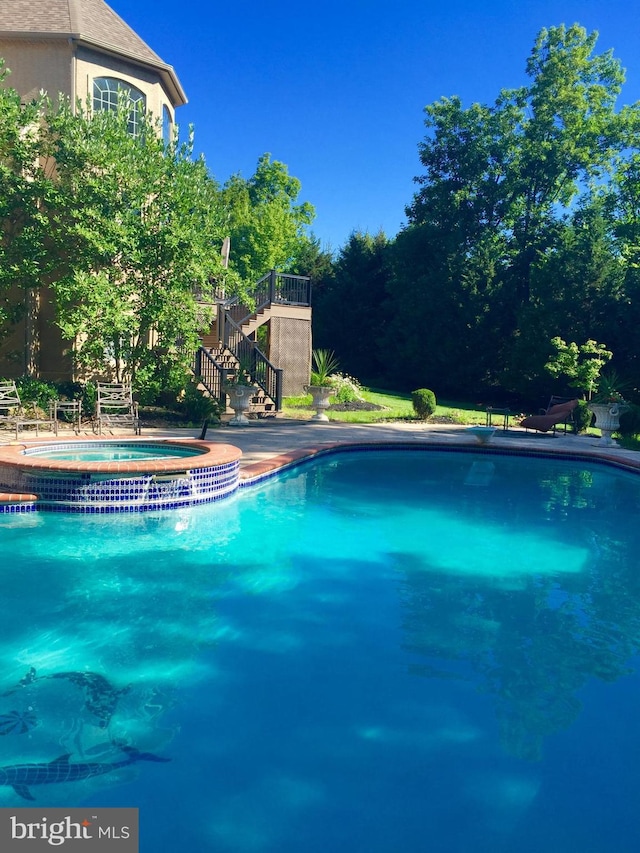 1389 Lamplighter Cir, Gwynedd, PA 19436 - swimming pool featuring an in-ground hot tub and stairway