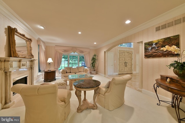 1389 Lamplighter Cir, Gwynedd, PA 19436 - living room featuring crown molding, arched walkways, a high end fireplace, decorative columns, and recessed lighting
