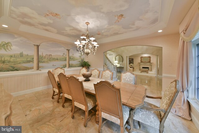 1389 Lamplighter Cir, Gwynedd, PA 19436 - dining area featuring arched walkways, a chandelier, a wainscoted wall, crown molding, and recessed lighting
