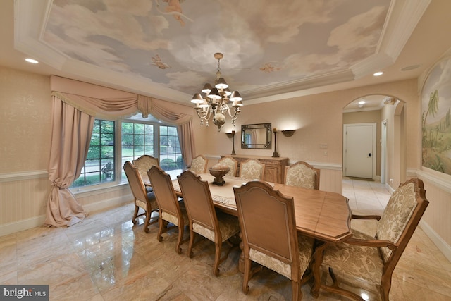 1389 Lamplighter Cir, Gwynedd, PA 19436 - dining space with a chandelier, arched walkways, wainscoting, a tray ceiling, and ornamental molding