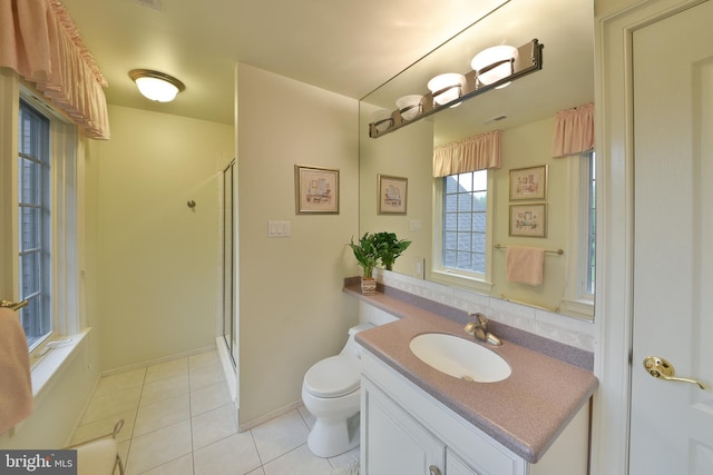 1389 Lamplighter Cir, Gwynedd, PA 19436 - bathroom with a shower stall, toilet, tile patterned flooring, vanity, and baseboards