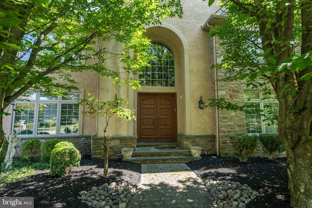 1389 Lamplighter Cir, Gwynedd, PA 19436 - view of exterior entry featuring stone siding and stucco siding
