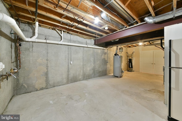 1389 Lamplighter Cir, Gwynedd, PA 19436 - unfinished basement with gas water heater and freestanding refrigerator