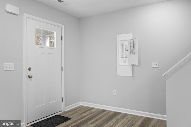 entrance foyer featuring baseboards, dark wood-style flooring, and visible vents