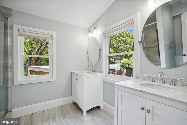 7507 Carroll Ave, Takoma Park, MD 20912 - bathroom featuring two vanities and plenty of natural light