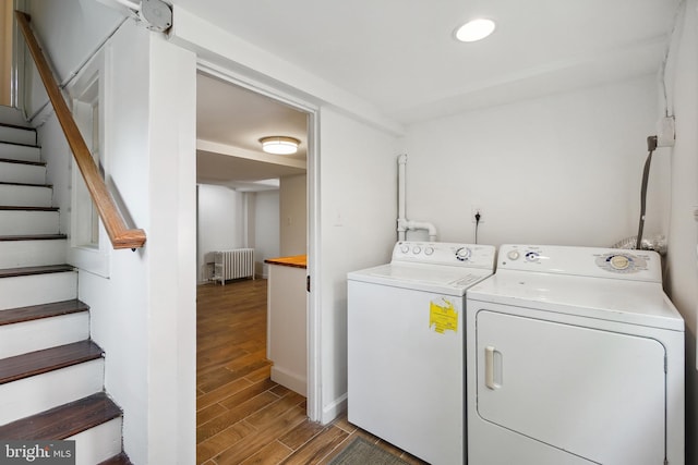7507 Carroll Ave, Takoma Park, MD 20912 - washroom featuring radiator heating unit, washing machine and dryer, light wood finished floors, and recessed lighting