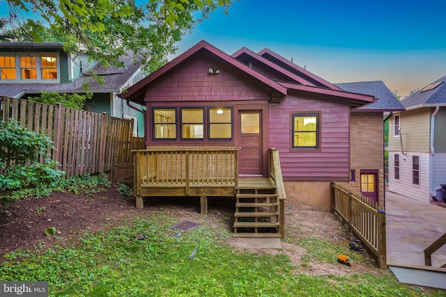 7507 Carroll Ave, Takoma Park, MD 20912 - back of house at dusk with a deck