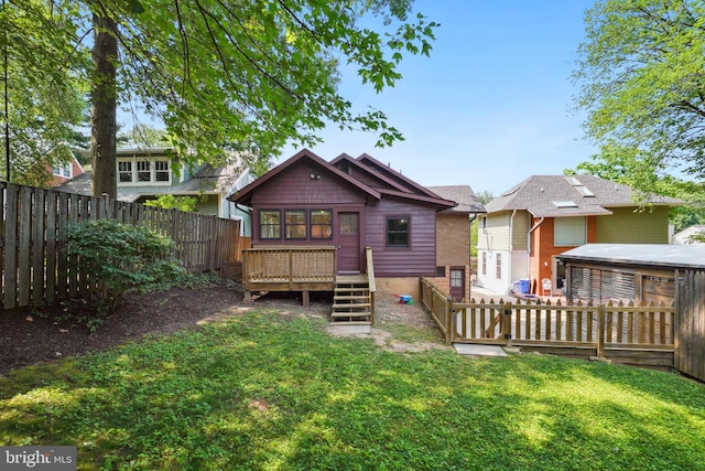 7507 Carroll Ave, Takoma Park, MD 20912 - rear view of property with a deck and a fenced backyard
