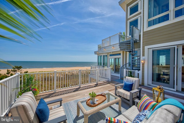 40113 Owens Ct, Fenwick Island, DE 19944 - view of patio / terrace with an outdoor hangout area, a water view, a view of the beach, and a balcony
