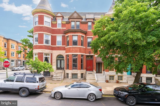 2133 Bolton St, Baltimore, MD 21217 - view of front of property with a high end roof and brick siding