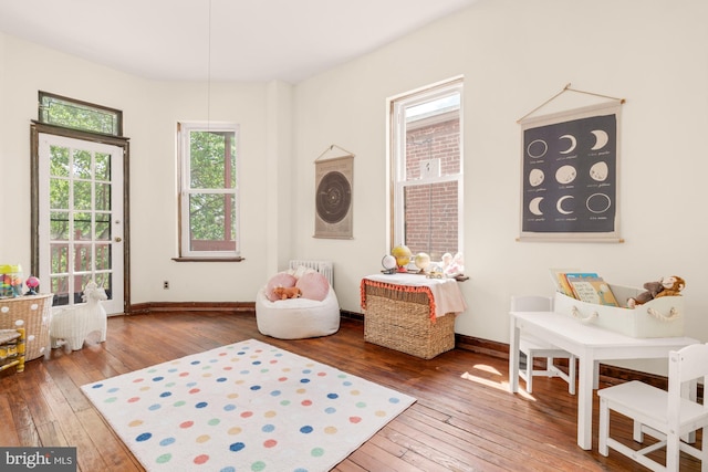 2133 Bolton St, Baltimore, MD 21217 - rec room featuring hardwood / wood-style floors and baseboards