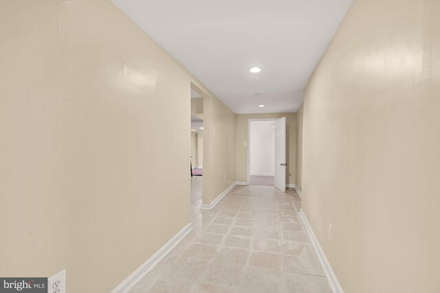 2133 Bolton St, Baltimore, MD 21217 - hall with recessed lighting, light tile patterned flooring, and baseboards