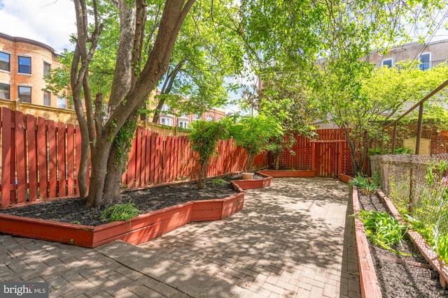 2133 Bolton St, Baltimore, MD 21217 - deck with a fenced backyard and a patio area