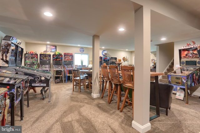 interior space featuring carpet flooring, a bar, and recessed lighting