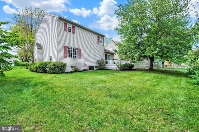 back of house featuring central AC