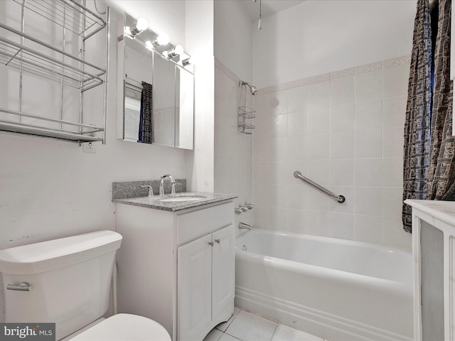 full bath with tile patterned floors, toilet, tub / shower combination, and vanity