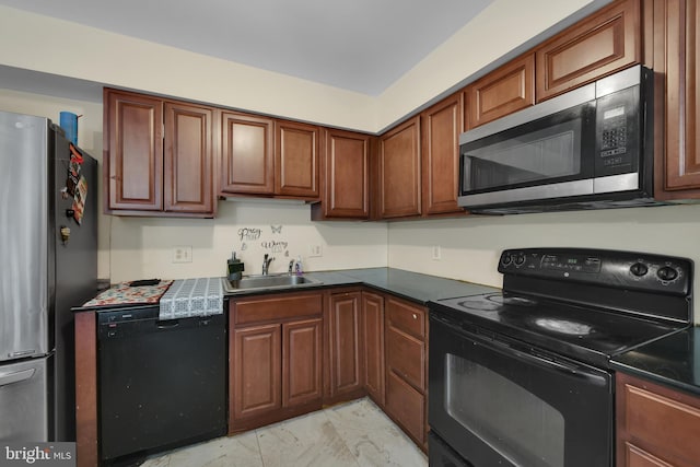 kitchen featuring black appliances, a sink, light marble finish flooring, dark countertops, and brown cabinets
