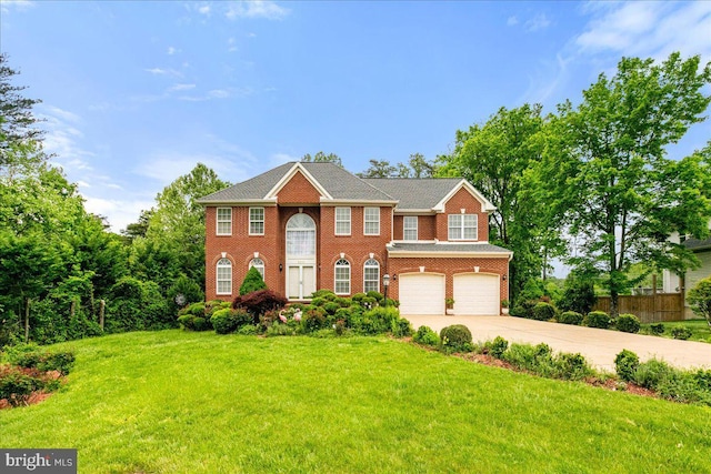 view of front of property featuring an attached garage, driveway, and brick siding