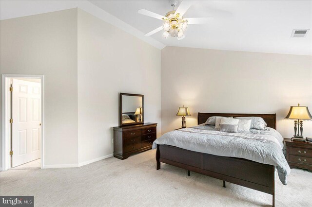 bedroom featuring vaulted ceiling, carpet flooring, baseboards, and a ceiling fan