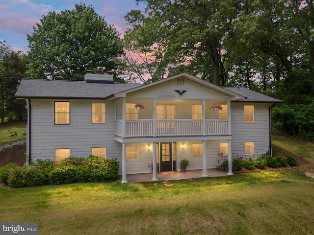 1990 Kate Dr, Port Republic, MD 20676 - rear view of property with a patio area, a yard, a balcony, and roof with shingles