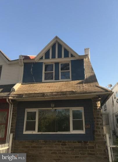view of home's exterior with a chimney