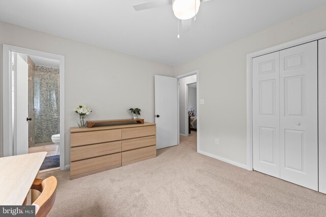 9518 Center St, Vienna, VA 22181 - bedroom featuring light colored carpet, a closet, ensuite bathroom, a ceiling fan, and baseboards