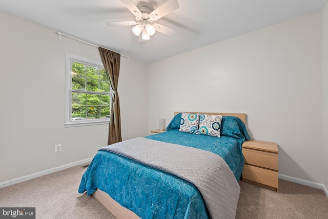 9518 Center St, Vienna, VA 22181 - carpeted bedroom featuring baseboards and a ceiling fan
