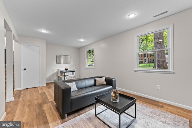 9518 Center St, Vienna, VA 22181 - living area with light wood-style flooring, baseboards, and recessed lighting