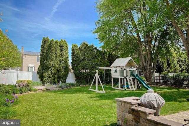 view of yard featuring a playground