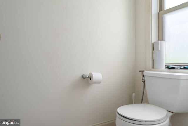half bathroom with toilet