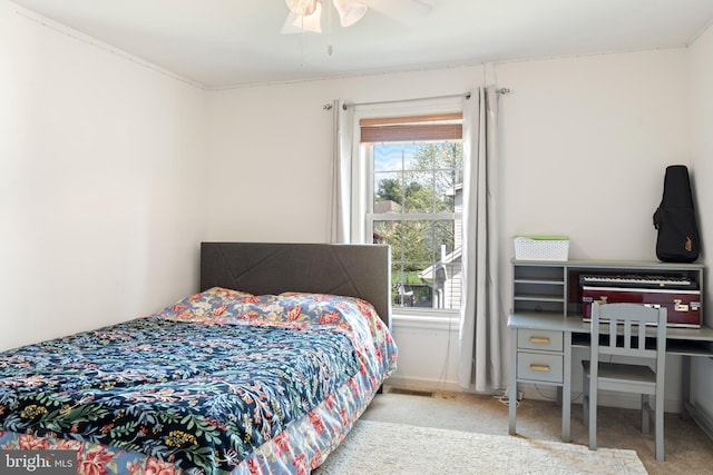 bedroom featuring carpet floors and baseboards