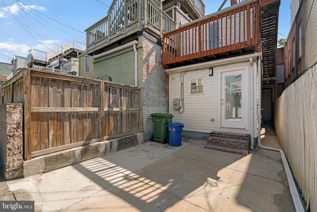 722 S Clinton St, Baltimore, MD 21224 - view of patio featuring a balcony and entry steps