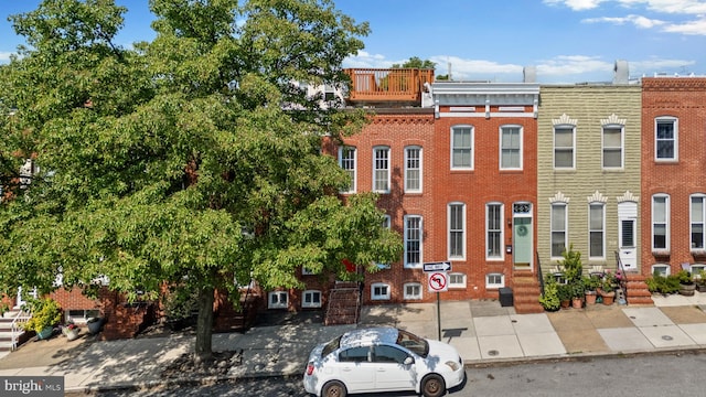 722 S Clinton St, Baltimore, MD 21224 - view of front of home with brick siding