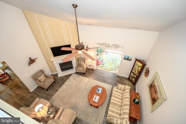7400 Michael Ave, Easton, MD 21601 - living room featuring wood finished floors, a ceiling fan, a premium fireplace, and baseboards