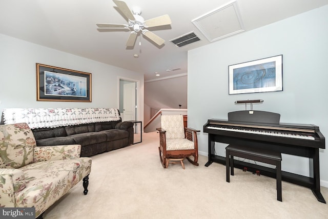 7400 Michael Ave, Easton, MD 21601 - living room featuring a ceiling fan, attic access, light carpet, and baseboards