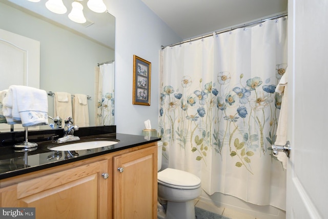 7400 Michael Ave, Easton, MD 21601 - full bathroom with vanity, toilet, shower / bath combo, and tile patterned floors