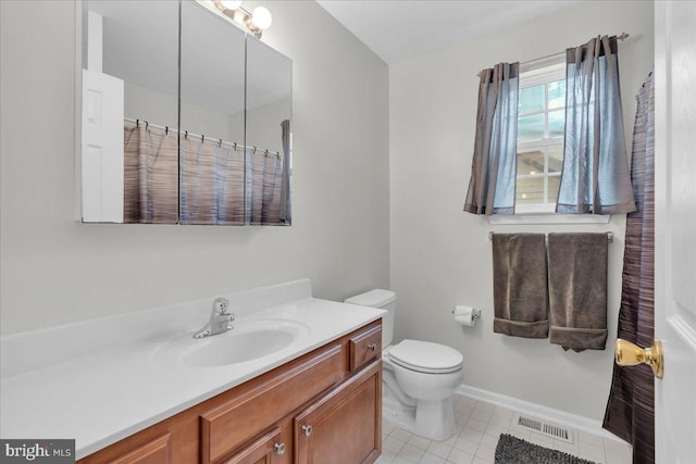 full bath featuring toilet, baseboards, visible vents, tile patterned flooring, and vanity