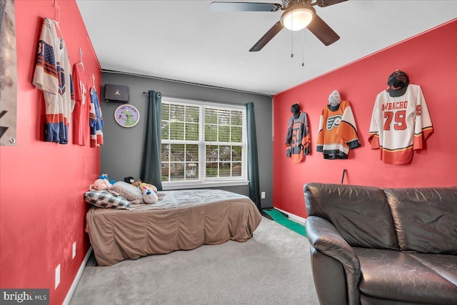 bedroom featuring carpet floors, baseboards, and a ceiling fan