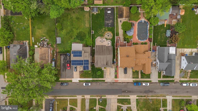 birds eye view of property with a residential view