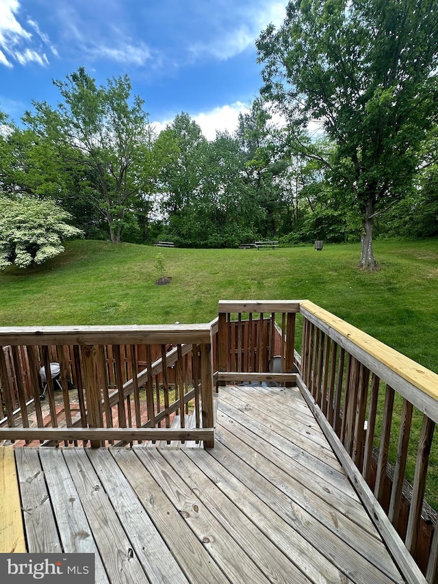 937 Dunloring Ct, Upper Marlboro, MD 20774 - deck featuring a lawn and view of wooded area
