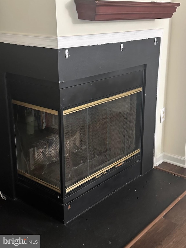 937 Dunloring Ct, Upper Marlboro, MD 20774 - detailed view of baseboards and wood finished floors