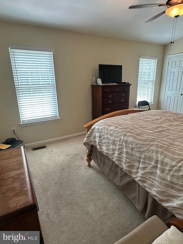 937 Dunloring Ct, Upper Marlboro, MD 20774 - carpeted bedroom with baseboards and ceiling fan
