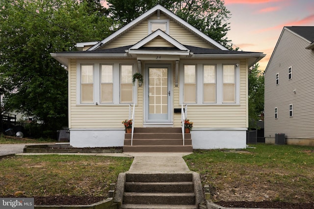 bungalow-style home featuring entry steps