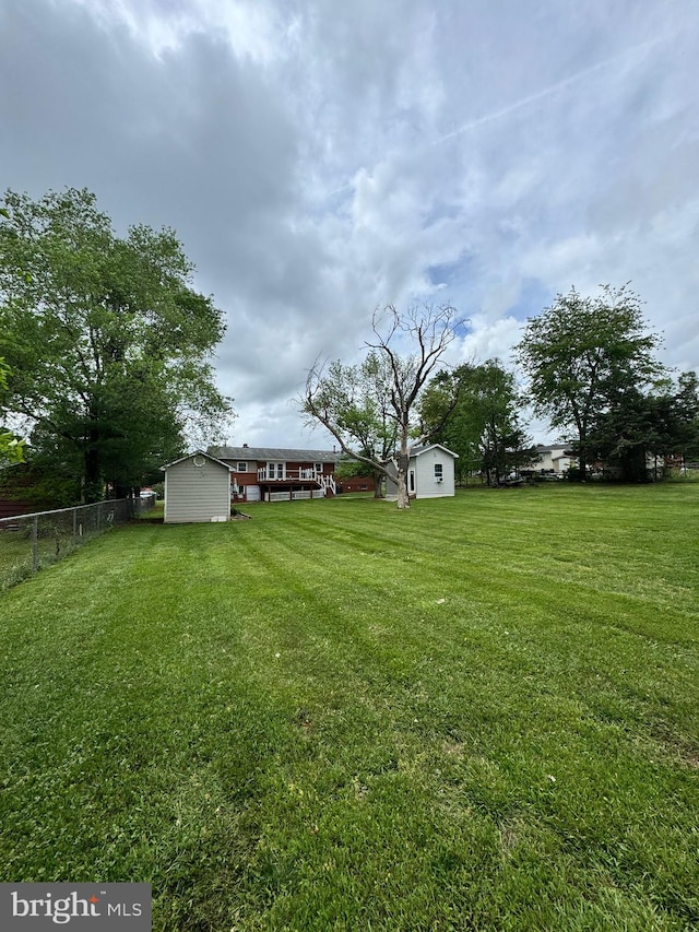 view of yard with fence
