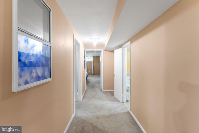 7703 Huron Dr, Gainesville, VA 20155 - hallway featuring carpet flooring and baseboards